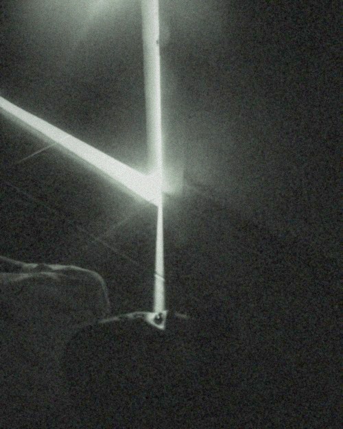 Light cutting through a door left ajar